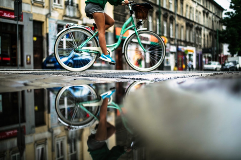 urban, teal, refelction, city, building exterior, ewitsoe, bicycle, motion, travel, warm temperature, cyclist, human body part, cute, dutch, architecture