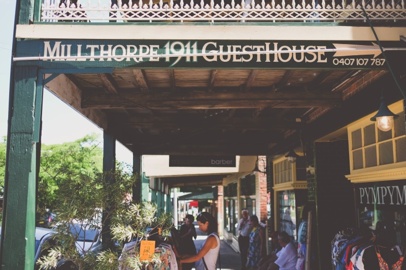 group of people, store fronts, men, script, crowd, built structure, adult, real people, large group of people, day, retail, text, outdoors, australia, vendors