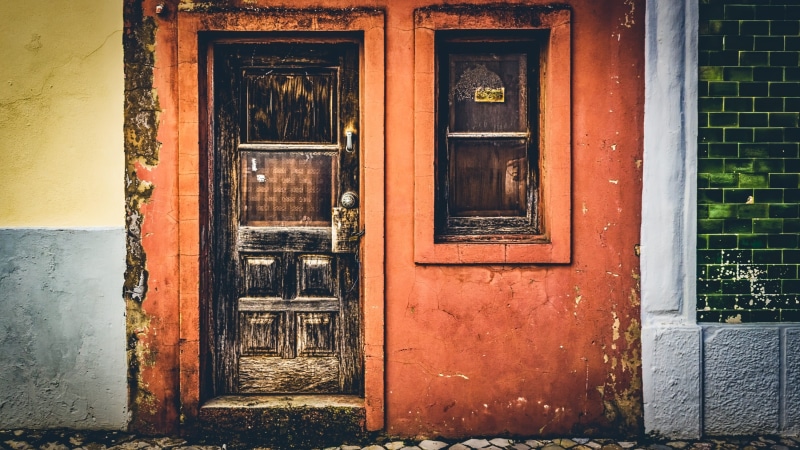 storefront, facade, architecture, building, wall - building feature, no people, building exterior, outdoors, weathered, day, wall, closed, residential district