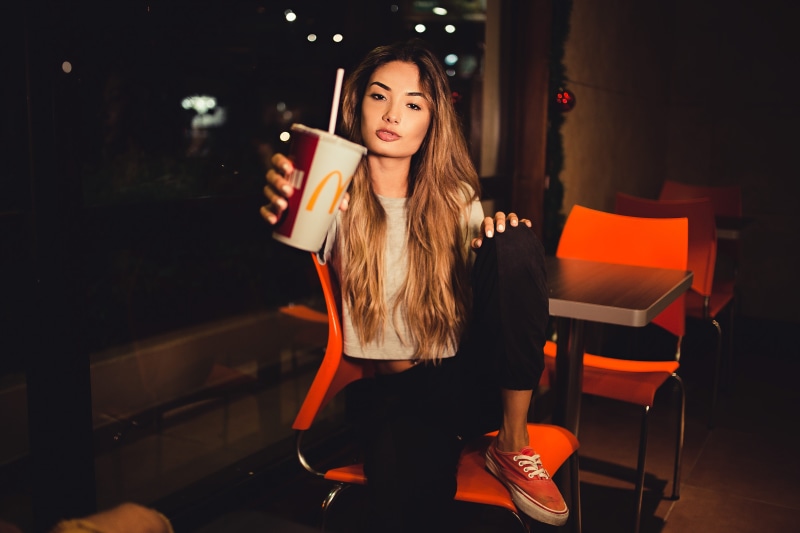 lips, young, lifestyles, drink, one person, chairs, adult, beautiful, lights, female, Soft drink, human, real people, eyes, fashionable, close-up, attractive