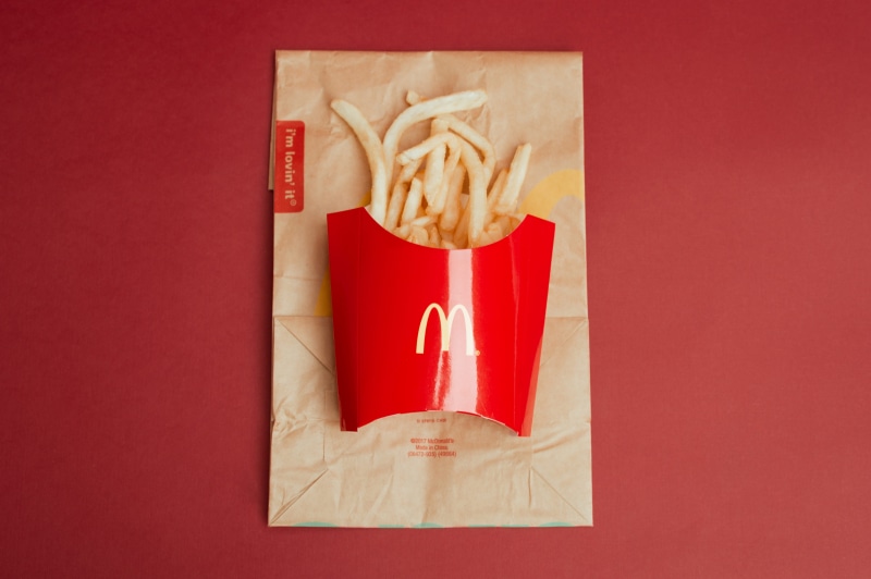 sandwich wrap, paper bag, hot dog, advertisement, food and drink, mayonnaise, fast food, taco, close-up, healthcare and medicine, text, poster, box - container