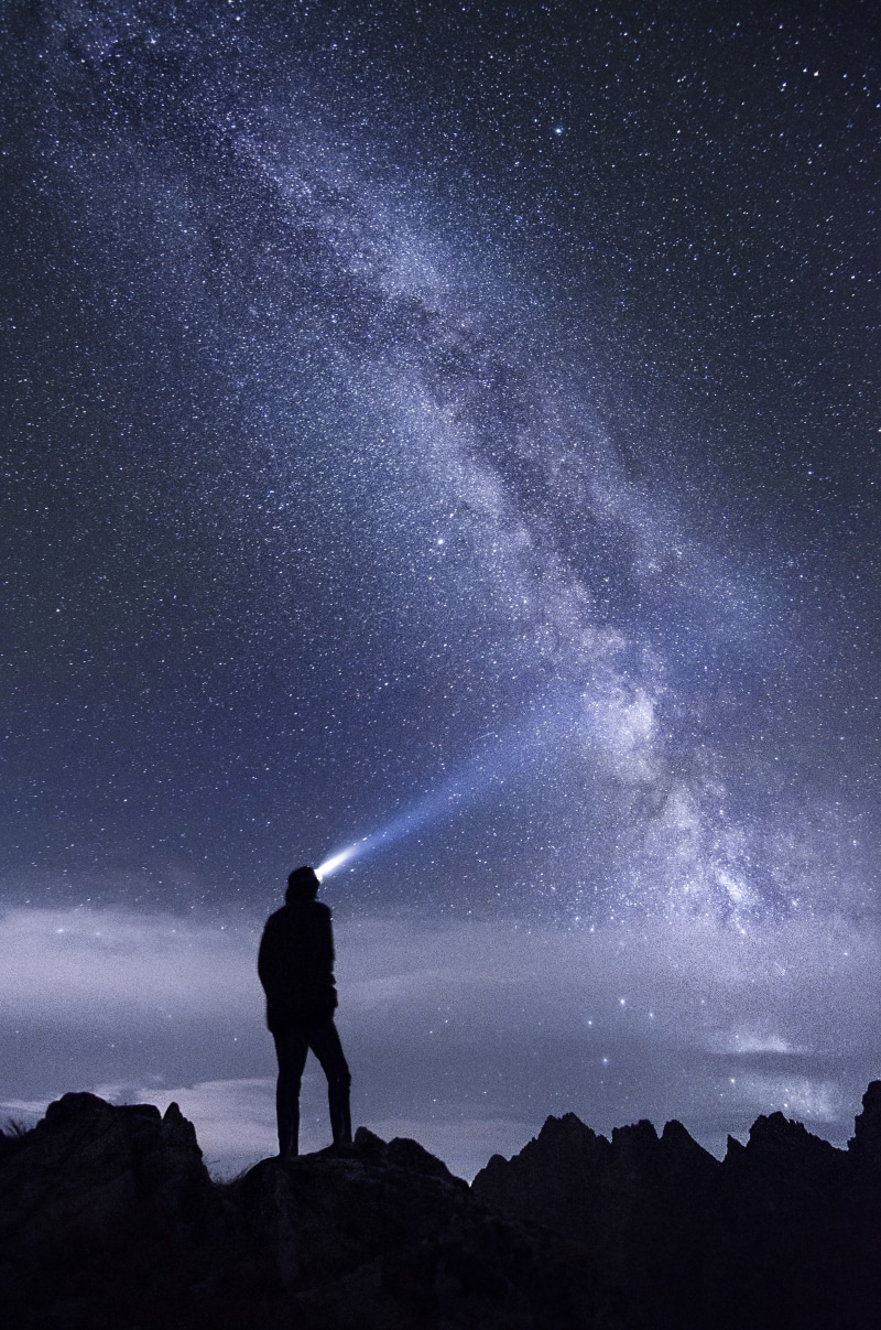 constellation, tranquil scene, headlamp, 4K, person, trek, peaks, looking, summit, back, climb, real people, beauty in nature, space, astronomy, star field