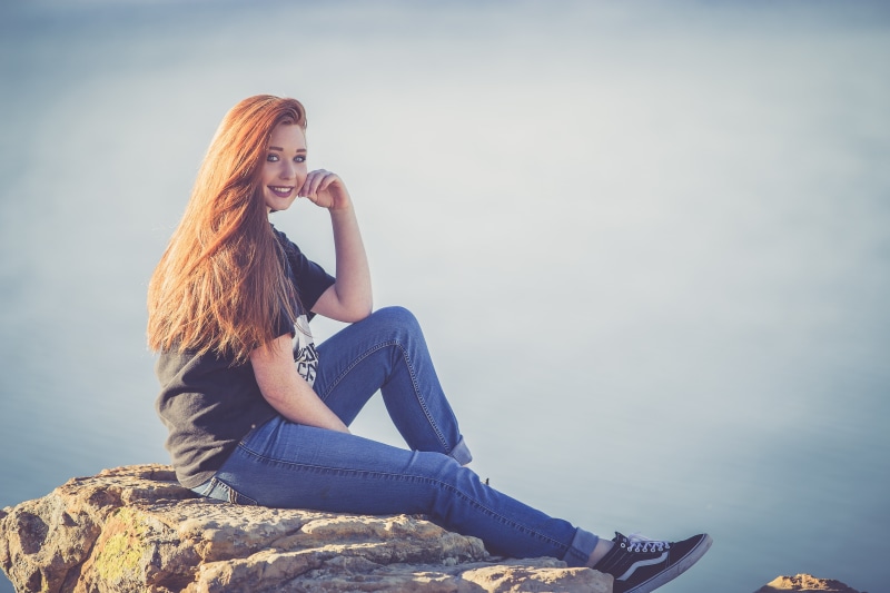 women, redhead, people, one young woman only, young adult, rock, one woman only, woman, happy, leisure activity, hairstyle, water, 5K, long hair, lifestyles