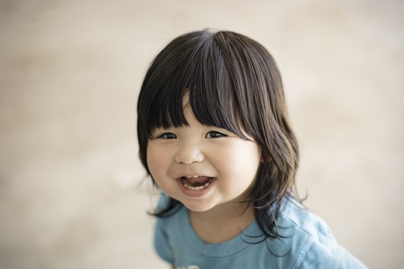 smiling, small, looking at camera, focus on foreground, fun, toddler, hairstyle, happiness, close-up, little, healthy, adorable, care, happy, joy, 5K