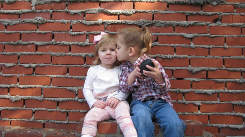 togetherness, front view, sister, child, people, pants, granddaughter, caucasian Ethnicity, white, two people, three quarter length, 2K, kiss, leisure activity