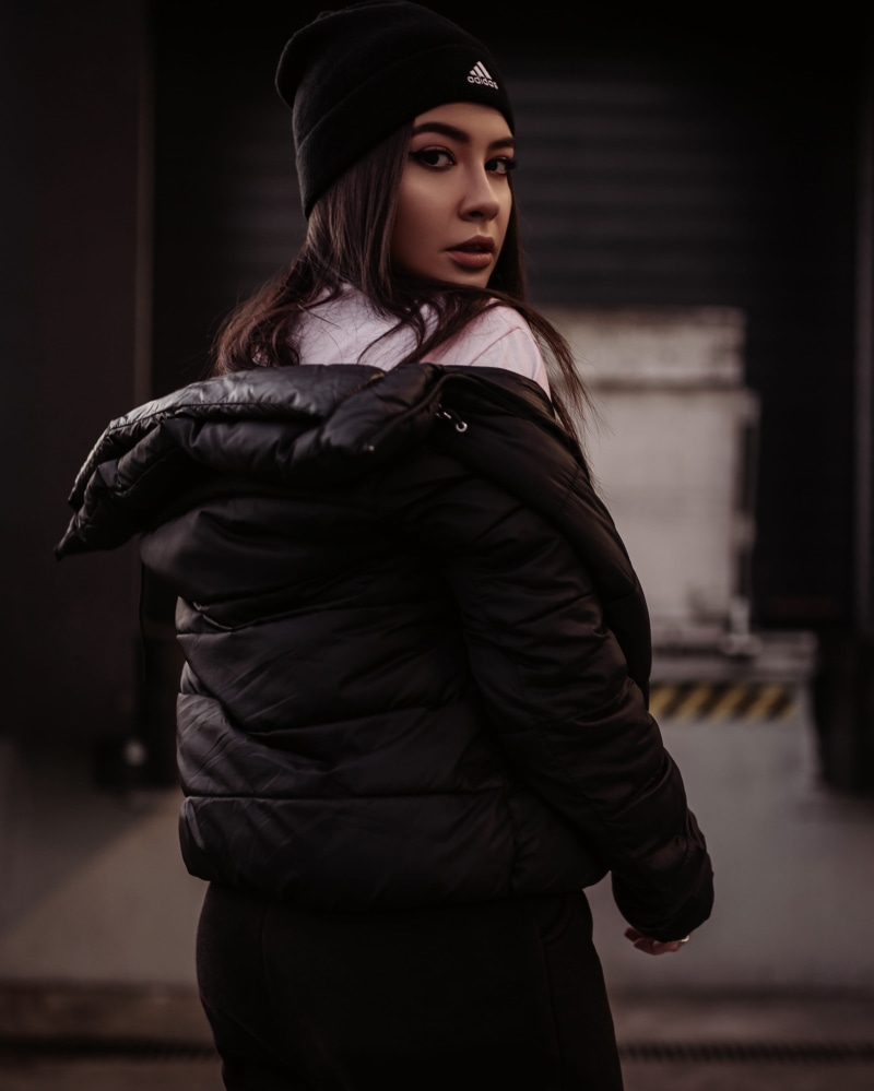 sleeve, hat, coat, beauty, female, turning, young adult, one person, lifestyles, young women, beanie, overcoat, scarf, hood, footwear, looking, leather