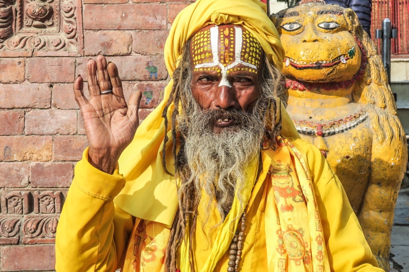 face, 2K, architecture, raincoat, person, travel, clothing, right, standing, day, raising, sadhu, nepal, explore, belief, males, apparel, asia, one person