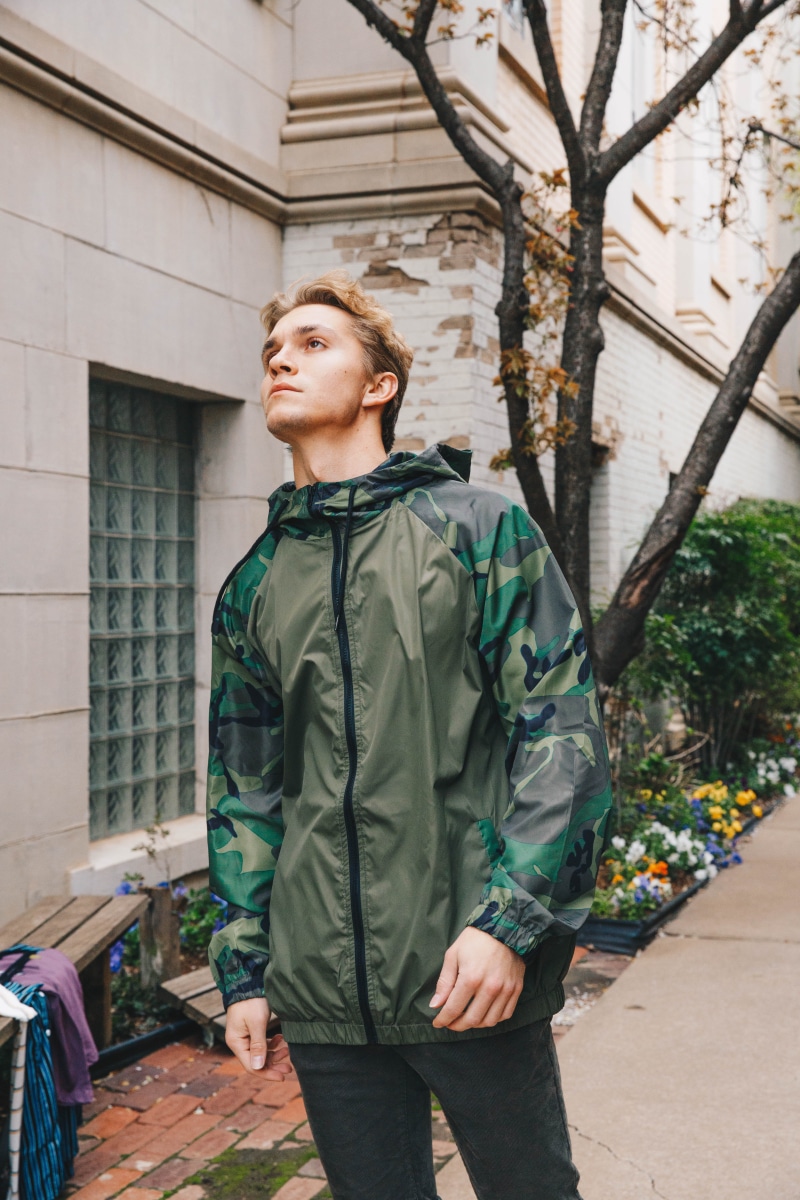 leisure activity, backpack, tree, military, architecture, human, zip, unknown, contemplation, jacket, military uniform, day, males, pergola, one person