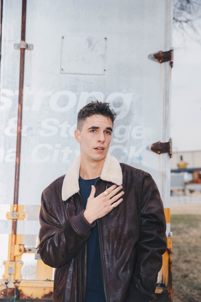 crowd, contemplation, beautiful people, jacket, sleeve, 5K, touching, one person, leather jacket, hand, lifestyles, hardhat, long sleeve, front view, premiere
