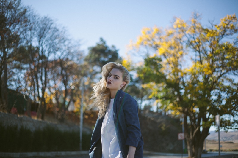 overcoat, standing, one person, wearing, tbilisi, female, top, sweater, hairstyle, young women, woman, coat, portrait, blond hair, sleeve, lake lisi, front