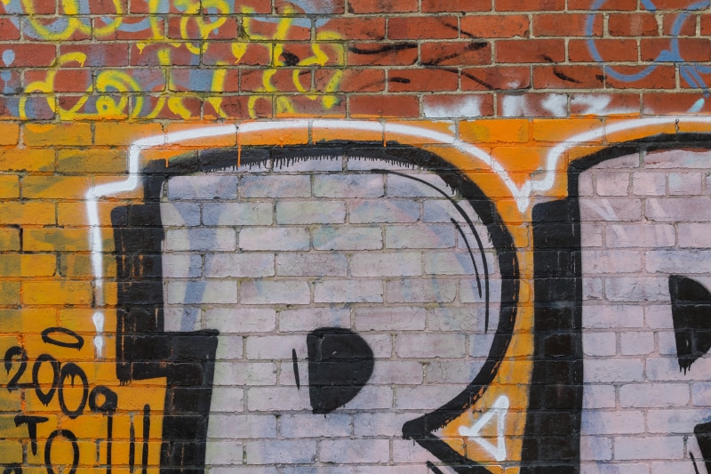 multi colored, mosaic, outdoors, full frame, creativity, western script, wall - building feature, paint container, coat, painting, window, clothing, handrail
