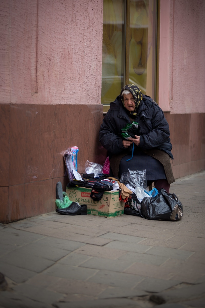 4K, one person, architecture, mature adult, outdoors, shelf, flooring, warm clothing, plastic bag, real people, unemployment, path, apparel, coat, furniture