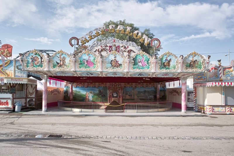 funfair, theme, coaster, animal representation, multi colored, travel destinations, street, fair, theme park, shorts, apparel, built structure, playground