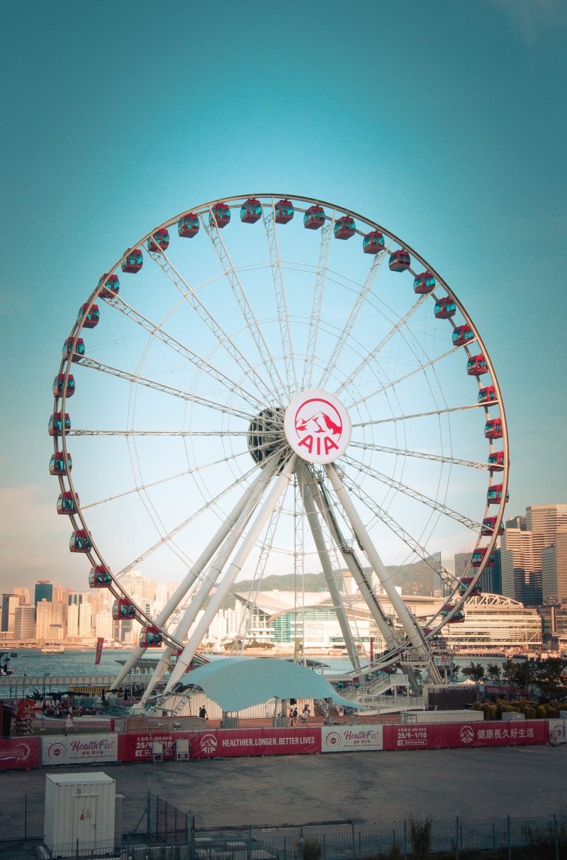 clear sky, sky, apparel, human, amusement park, travel, boat, nature, ride, branded, vehicle, no people, built structure, logo, sleeve, arts culture and entertainment