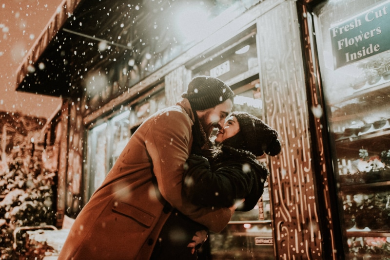 heterosexual couple, cold, bonding, couple - relationship, positive emotion, young adult, two people, women, hat, warm clothing, 5K, winter, kiss, couple