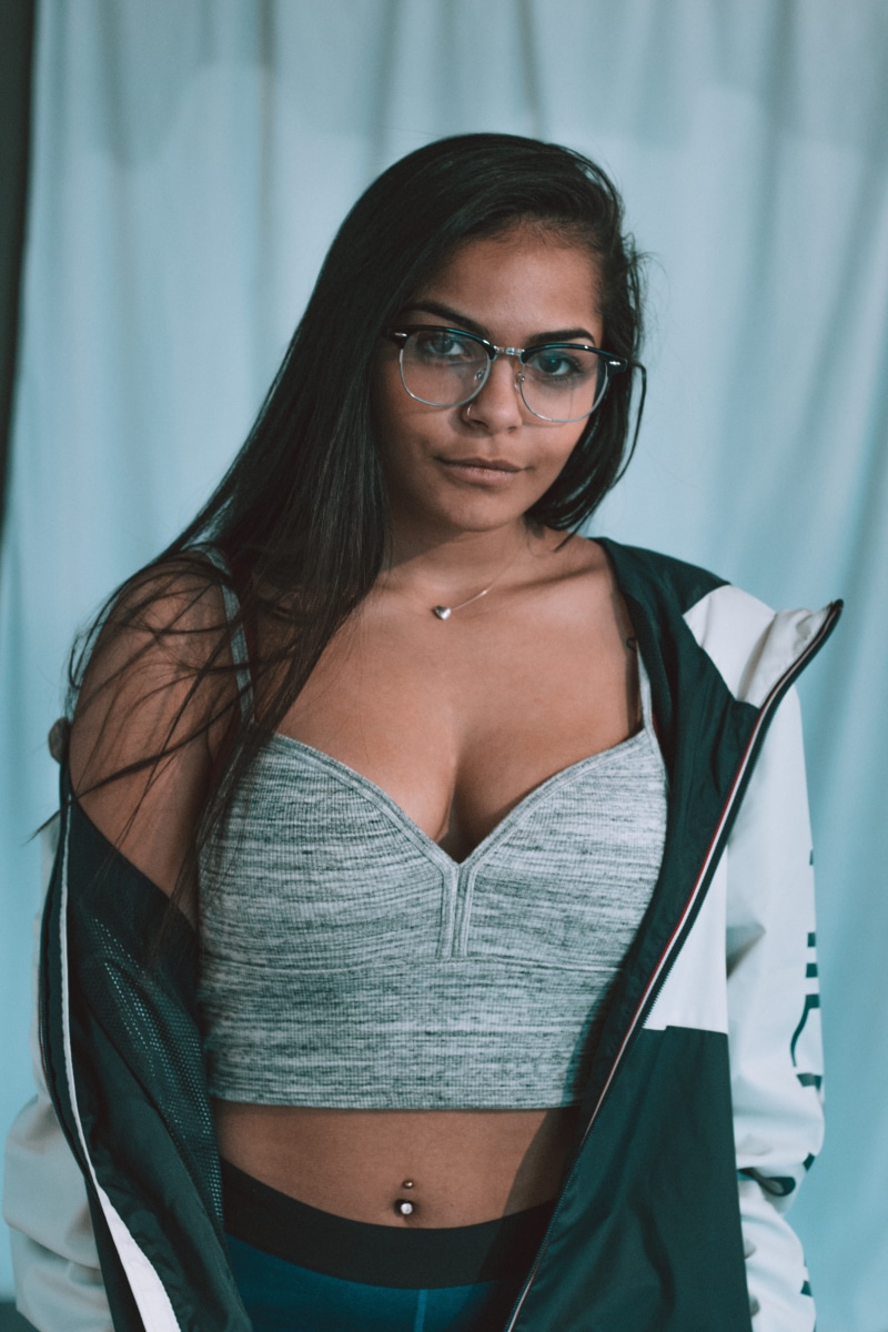 spring, store, young adult, front view, standing, lifestyles, eyeglasses, fashion, model, record store, one person, hair, portrait, beautiful woman, smart
