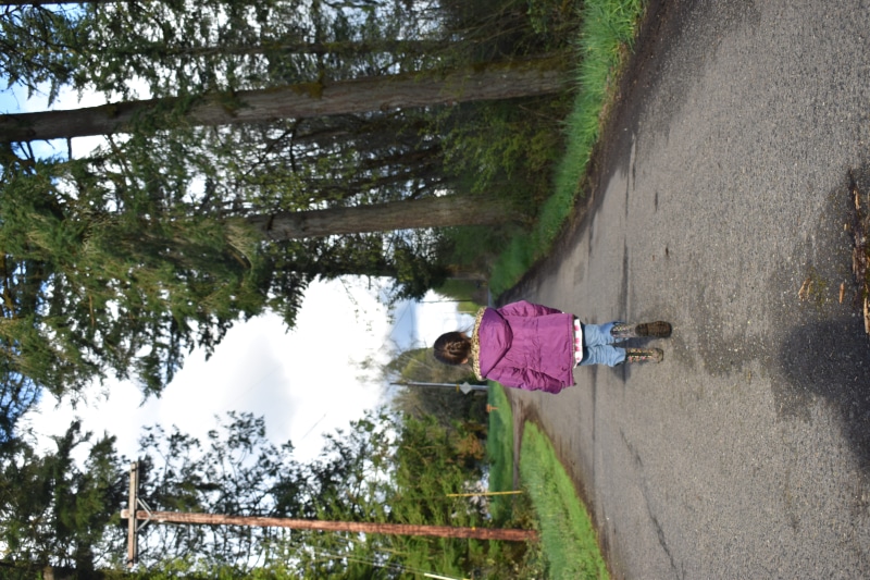 fir, overcoat, footwear, one person, abies, innocence, clothing, water, tree, shoe, apparel, sleeve, outdoors, road, child, gravel, day, women, full length