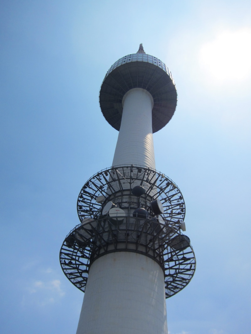 nature, sunlight, architecture, tourism, sky, tower, blue, tall - high, travel destinations, namsan tower, namsan, low angle view, communication, day, no people