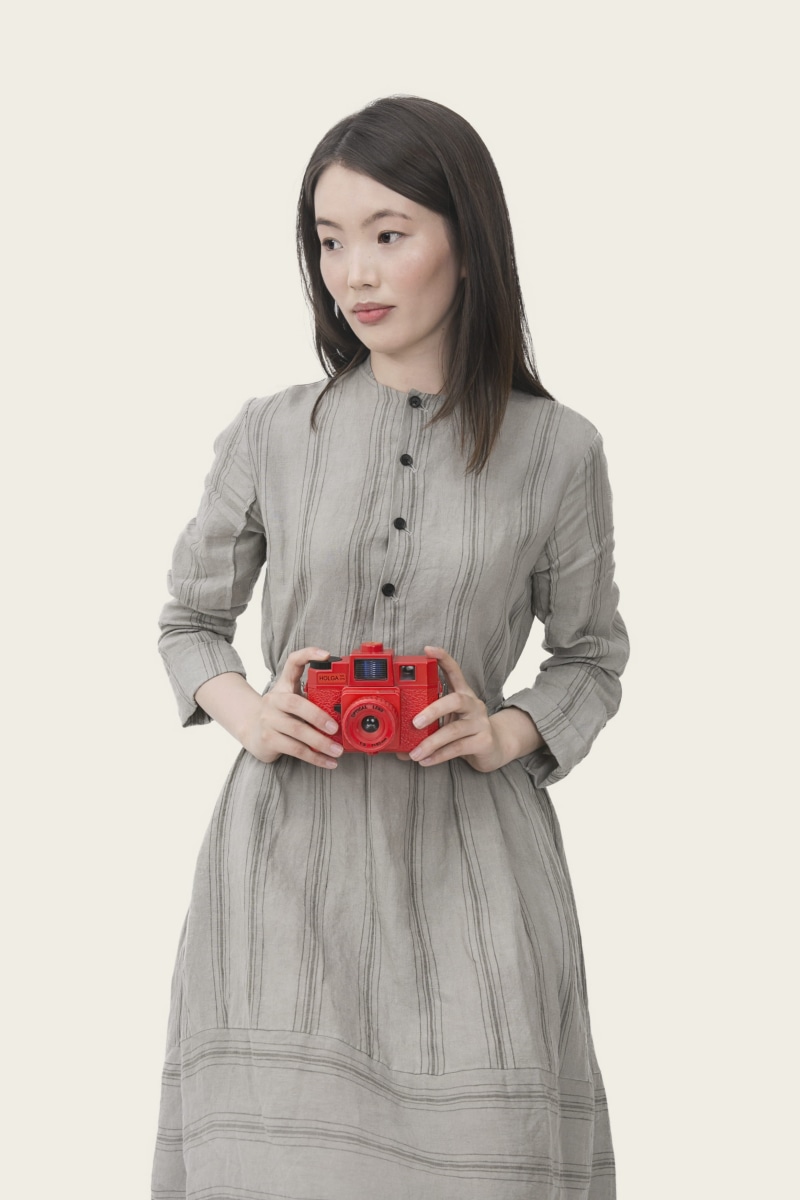 young adult, female, point, 2K, casual clothing, asian girl, gray, hairstyle, dress, shoot, white background, holding, looking at camera, striped, woman