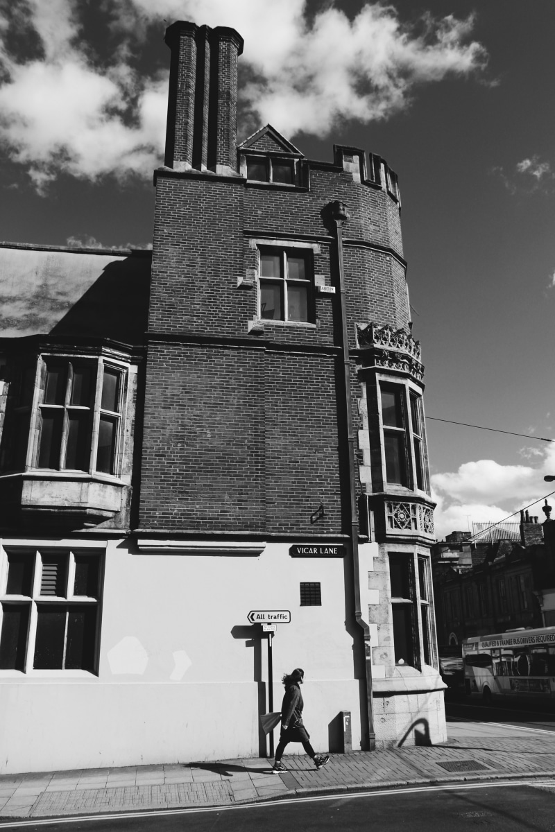 beside, one person, tower, real people, window, built structure, day, home decor, walking, sheffield, men, cloud - sky, building exterior, vicar lane street girl