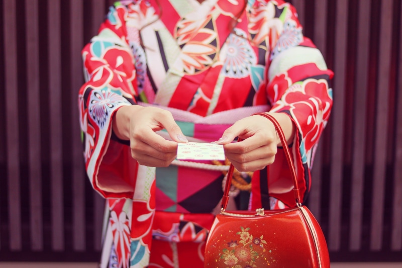 traditional Clothing, adult, clothing, striped, human hand, japanese Culture, focus on foreground, indoors, one Person, paper, hand, wearing, front view