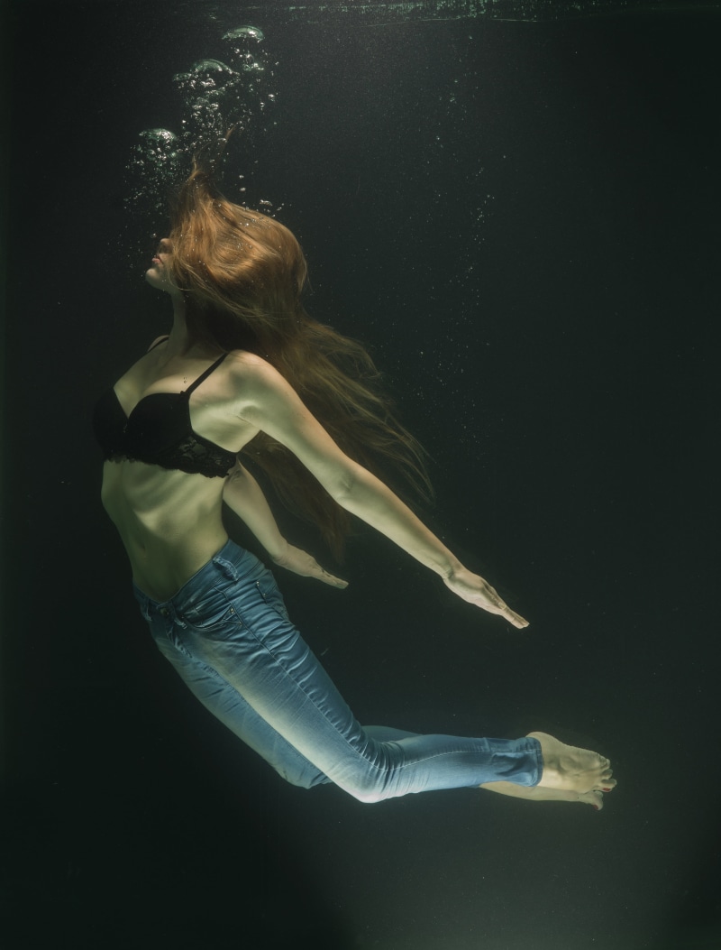 side view, suffocation, woman, wearing, dive, children only, blue, fashion, studio shot, deep, breath, beauty, swimming pool, child, concept, water, hairstyle