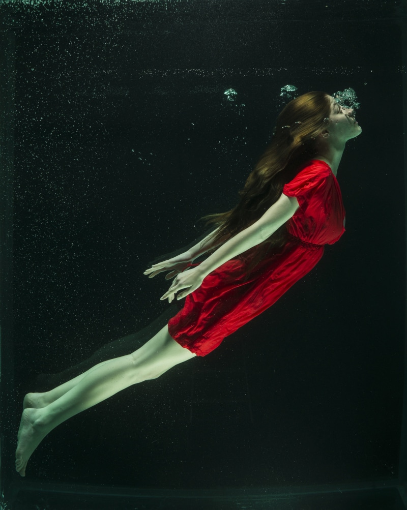 black background, hairstyle, art, aqua, full length, profile view, diving, diver, performance, motion, fashion, person, nature, digital composite, indoors