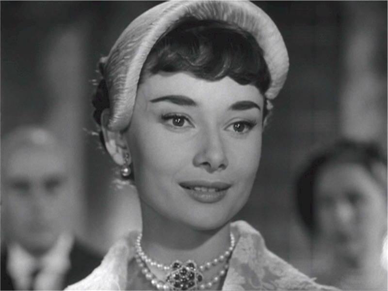 hat, film, photo, focus on foreground, cinema, woman, one young woman only, one person, pearl jewelry, scene, headshot, actress, beautiful woman, awards
