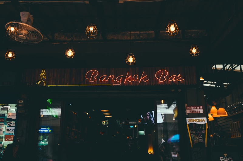 light, establishment, indoors, nightlife, bar - drink establishment, vintage, illuminated, cage, no people, night, text, sign, bulb, store, low angle view