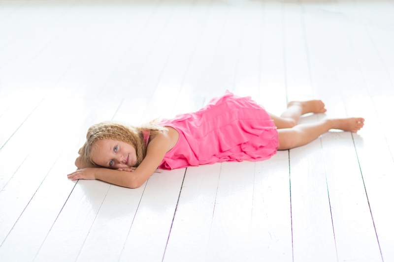 young, casual, sitting, pink, indoors, little, family, people, floor, sleeping, style, look, clothing, caucasian, attractive, relaxation, light, beautiful