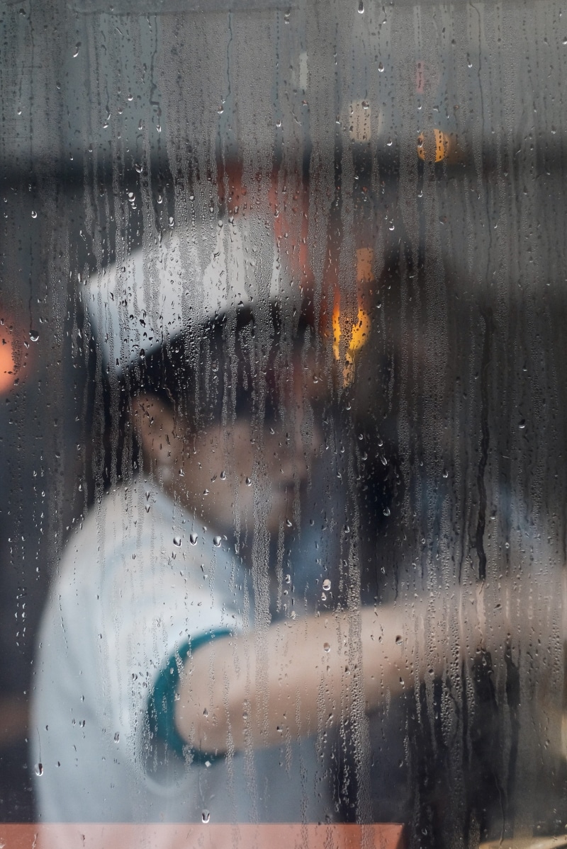 headshot, looking, leisure activity, work, one man only, shirt, childhood, glass - Material, reflection, seen, hat, drop, wall, wearing, real people, transportation