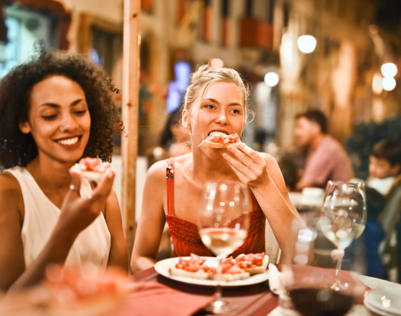 outdoor, two people, emotion, portrait, nightlife, female, glass, alcohol, food and drink, dining, bread, sitting, tomato, bruschetta, happiness, food