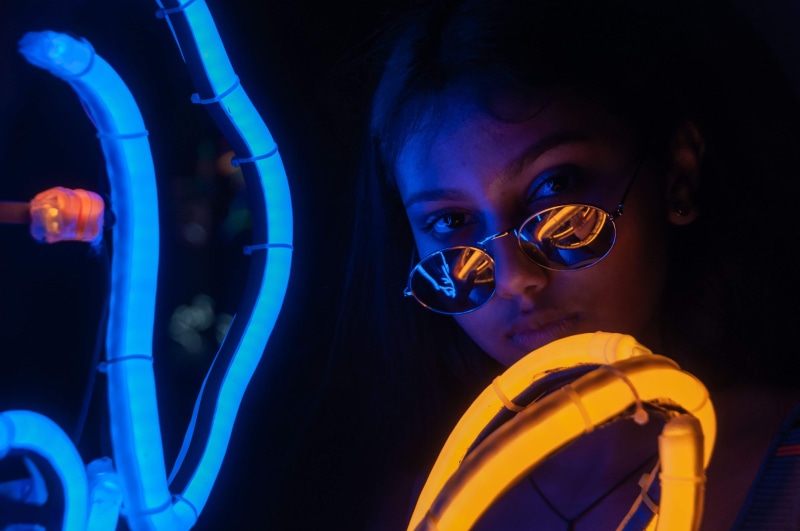 night time, focus, sunglasses, lights, youth, wear, men, studio shot, laser, indoors, close-up, childhood, evening, headshot, offspring, portrait, person