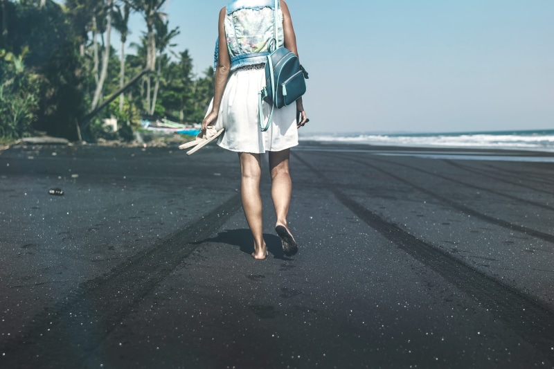 black, bali, vacation, transportation, rear view, one person, island, daytime, seashore, anonymous, 5K, black sand, coast, full length, leisure activity
