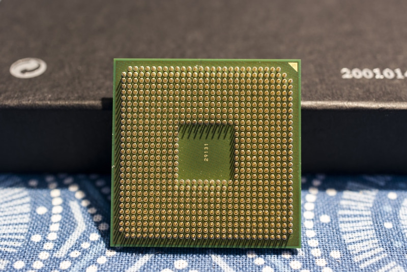 computer chip, circuit board, wealth, no people, amd sempron 2500, pattern, technology, industry, the rear side of the, finance, business, indoors, microchip