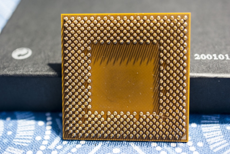metal, high angle view, from behind, textile, table, equipment, amd athlon xp 2200, pattern, amd, gold colored, tray, processor, design, technology, pc accessories