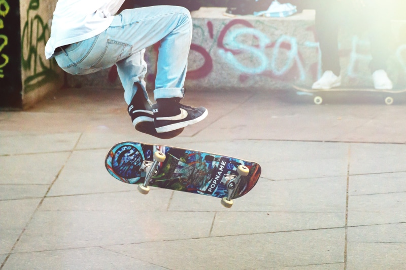 jumping, city, style, board, human leg, sidewalk, man, action, skating, men, outdoors, flooring, tiled floor, street, skater, body part, graffiti, lifestyle