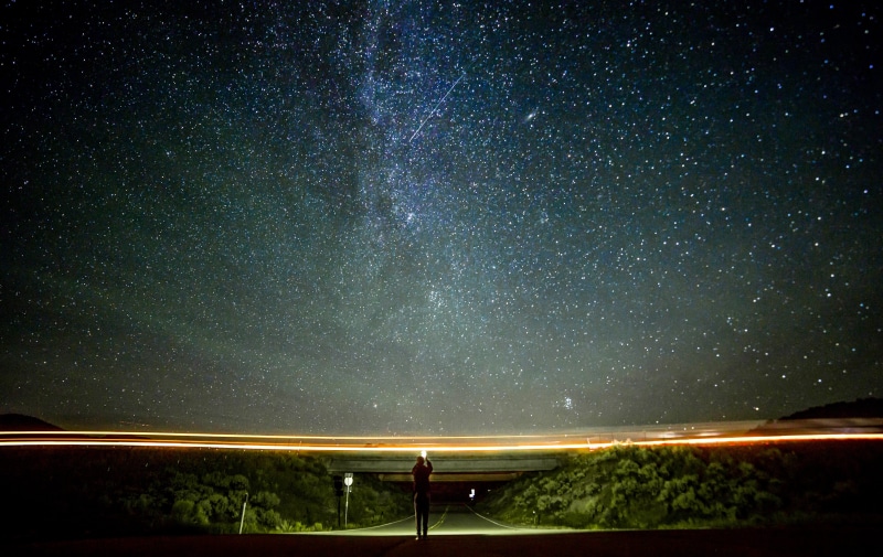 outer space, stars, milky way, infinity, street, road, night sky, light, one person, illuminated, outdoors, tranquil scene, concrete, roadtrip, milkyway