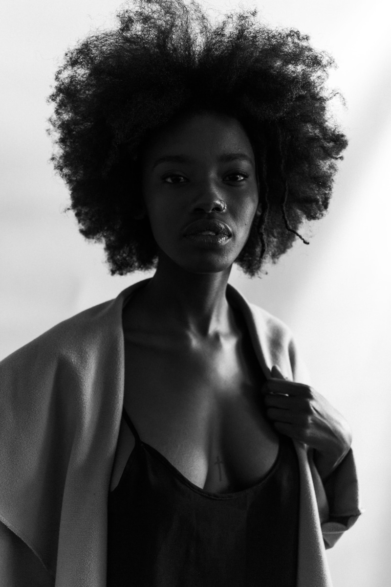 afro, standing, 5K, blazer, front view, young adult, photo, female, leisure activity, girl, wearing, woman, hair, human hair, casual clothing, serious