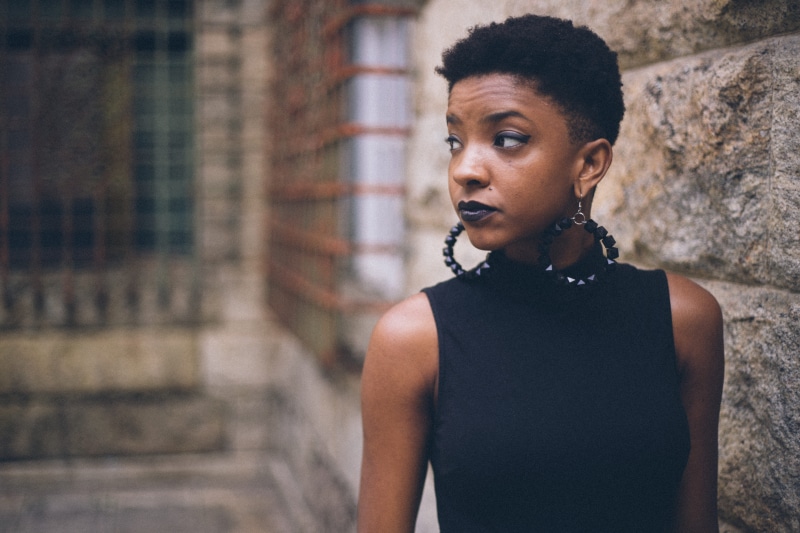 focus on foreground, afro, earrings, female, beauty, hoop, african Ethnicity, worried, wall, photography, urban Scene, lady, young Women, casual clothing