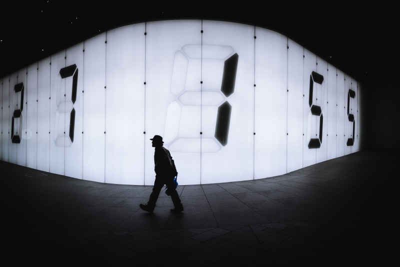 walking, man, typeface, clock, 1, men, night, person, near, city, 2, wall - building feature, walk, leisure activity, 7, silhouette, urban, male, building