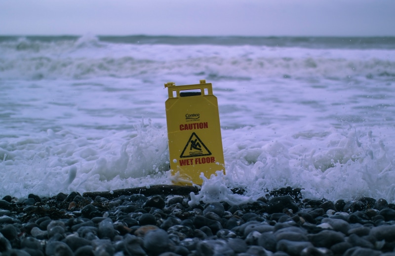 wet, wave, guidance, wet floor, text, aquatic sport, information, seashore, signage, daytime, warning Sign, power in nature, pebbles, sign, floor, danger