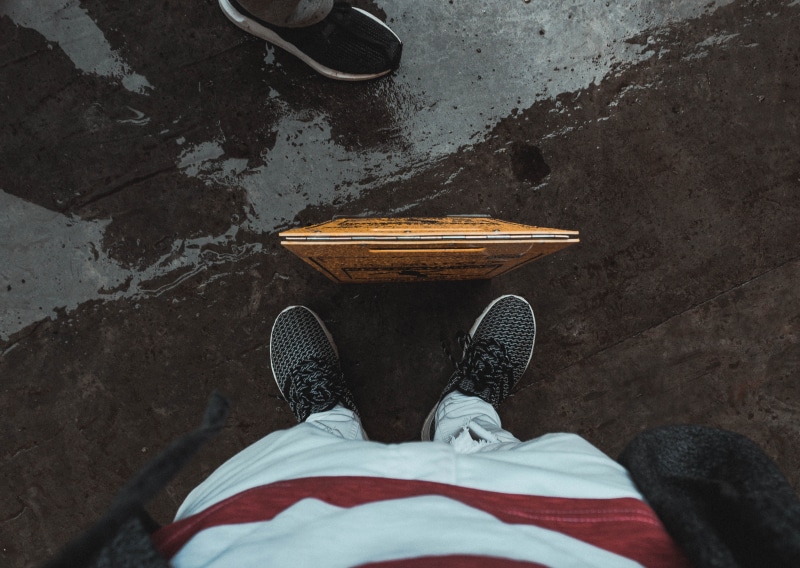 personal perspective, sneakerrs, human leg, street, wearing, leisure activity, brand, men, fashion, wet, model, clothing, step, rain, human foot, directly above