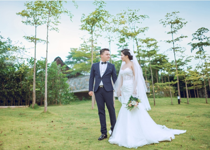 standing, young men, groom, event, married, grass, Bride and Groom, romance, positive emotion, togetherness, bouquet, daytime, flowers, trees, bride, wife