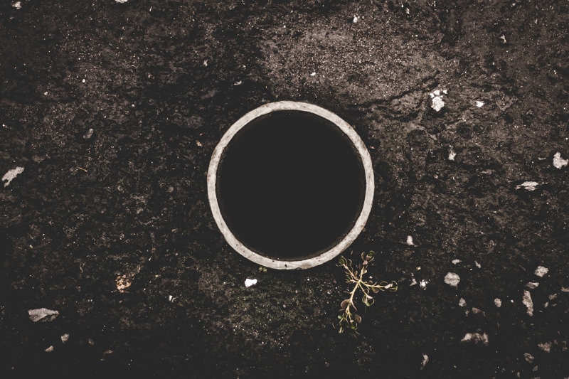 field, high angle view, nature, hole, drink, circle, close-up, photo, city, still life, street, day, coffee, backstreet, directly above, cityscape, streetview