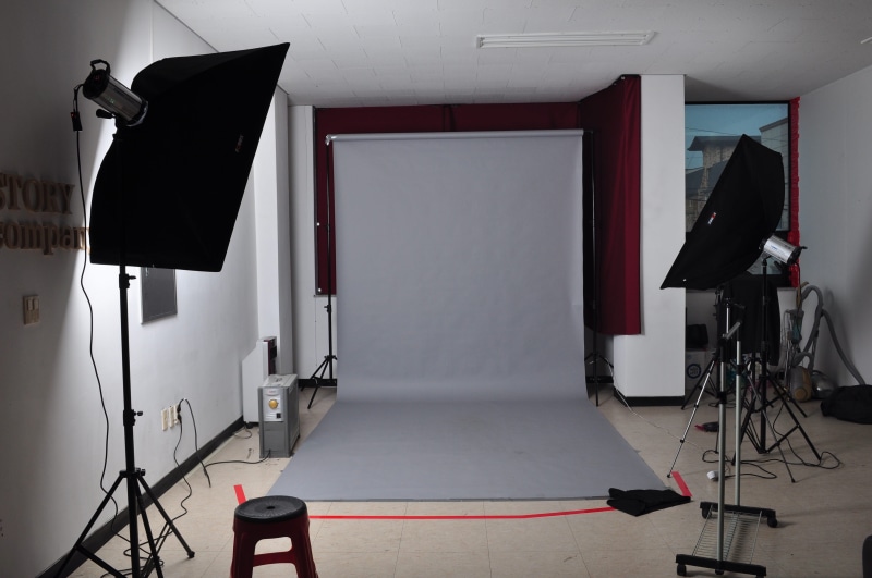 black, electric lamp, studio background, television studio, arts culture and entertainment, slr camera, no people, production, absence, film industry, red