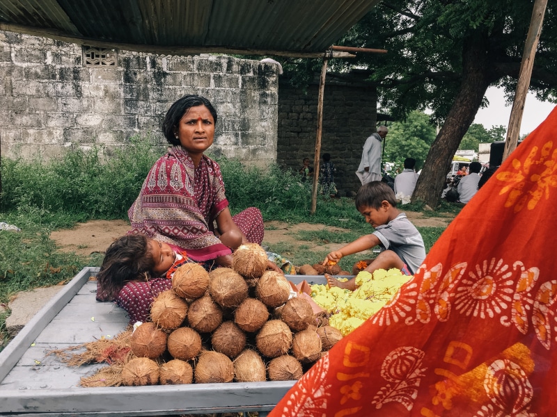 food, mailapur, retail, incidental people, indian, young adult, leisure activity, women, vendor, real people, sad, lifestyles, coconuts, market, freshness