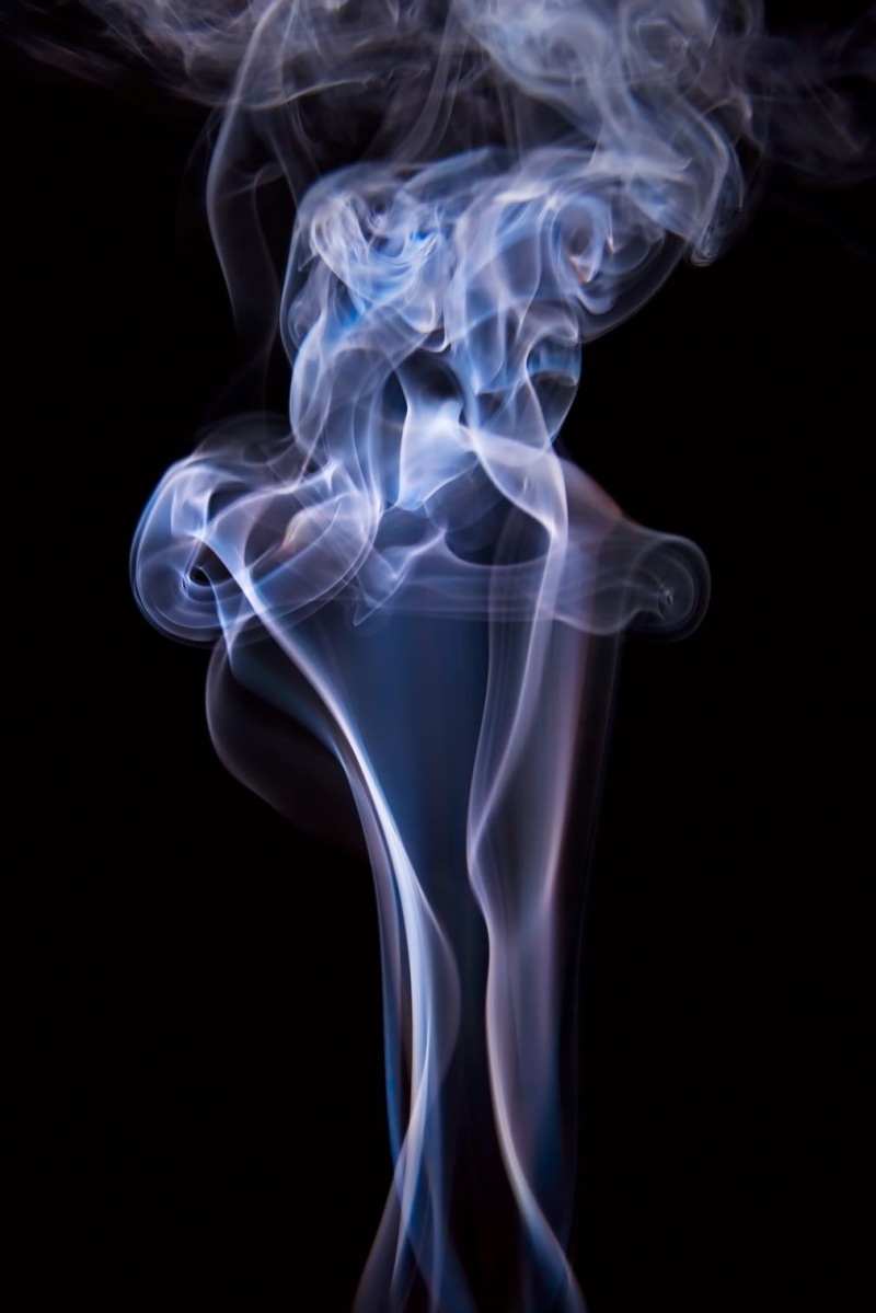 background, indoors, copy space, smoke - physical structure, translucent, nature, changing form, incense, scented, black background, transparent, no people
