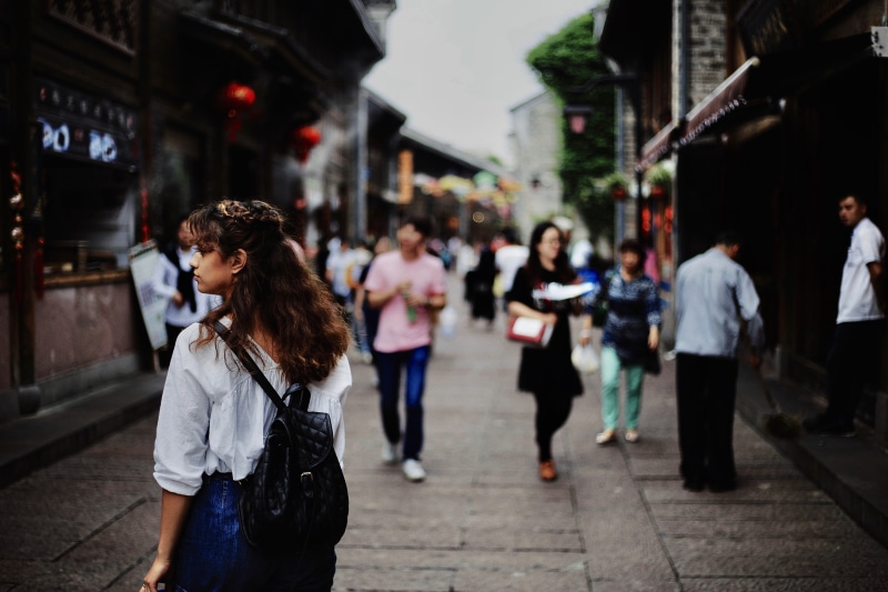 outdoors, editorial, leisure activity, one person, adult, street, city street, Lost, women, building exterior, group, lifestyles, houses, crowd, casual clothing
