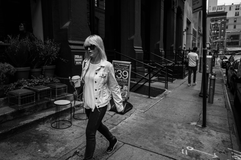 walking, front view, woman, one Person, standing, adult, young adult, adults only, lifestyles, street, grayscale, women, casual clothing, black And White